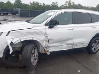 2021 Hyundai Santa Fe SEL z VIN 5NMS24AJ4MH340873, wystawiony jako IAAI lot #43300361 z przebiegiem 68 071 mil mil oraz . Historia ofert i sprzedaży dostępna na DreamBid. Obrazek 6.