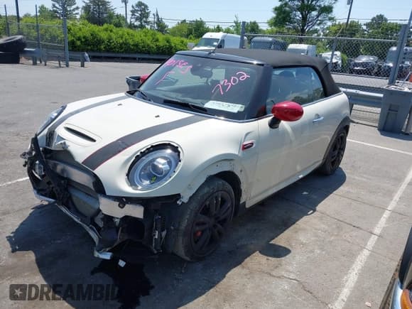 ✅ 2021 MINI Convertible • VIN: WMWWJ9C0XM3M07302 • Lot: 42027854. Listed on IAAI with 30,921 mi. Free auction sales archive from the USA and detailed vehicle history report at DreamBid. Image 20.