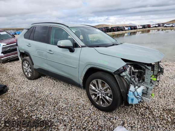 ✅ 2021 Toyota RAV4 XLE Premium • VIN: 2T3A1RFV5MC146289 • Lot: 82525335. Listed on Copart with 102,314 mi. Free auction sales archive from the USA and detailed vehicle history report at DreamBid. Image 4.