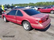 ✅ 1996 Ford Thunderbird LX • VIN: 1FALP62W0TH142986 • Лот: 42030900. Опубликован ранее на IAAI с пробегом 168 993 миль. Бесплатный доступ к архиву аукционных продаж из США и подробный отчёт об истории автомобиля на DreamBid. Изображение 3.