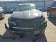 ✅ 2014 Chevrolet Impala LTZ • VIN: 1G1155S31EU123521 • Lot: 69943765. Listed on Copart with 130,958 mi. Free auction sales archive from the USA and detailed vehicle history report at DreamBid. Image 5.