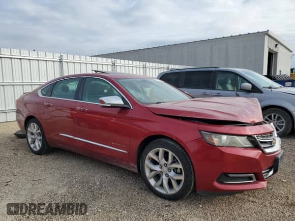 2014 Chevrolet Impala LTZ with VIN 1G1155S36EU145708, listed as a Copart auction lot 82423055 with 140,731 mi miles and Salvage title. Bid and sale history available at DreamBid. Image 4.