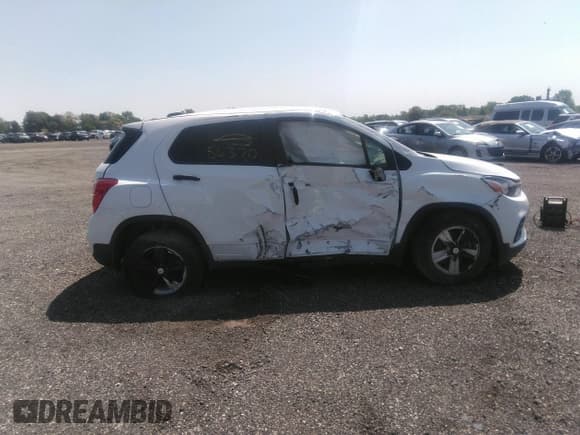 ✅ 2021 Chevrolet Trax LS • VIN: KL7CJKSBXMB302858 • Lot: 42356370. Listed on IAAI with 40,838 mi. Free auction sales archive from the USA and detailed vehicle history report at DreamBid. Image 13.