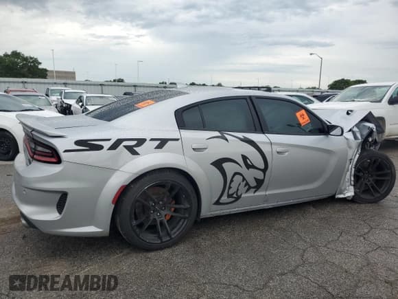 ✅ 2022 Dodge Charger SRT Hellcat Widebody • VIN: 2C3CDXL93NH113954 • Lot: 64892554. Listed on Copart with Not provided. Free auction sales archive from the USA and detailed vehicle history report at DreamBid. Image 3.