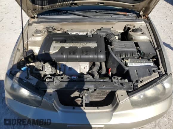 2002 Hyundai Elantra GLS z VIN KMHDN45D12U366014, wystawiony jako Copart lot #80770854 z przebiegiem 126 783 mil mil oraz Czysty tytuł • Clean title. Historia ofert i sprzedaży dostępna na DreamBid. Obrazek 11.