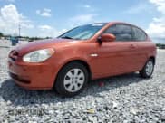 ✅ 2010 Hyundai Accent GS • VIN: KMHCM3AC6AU161518 • Лот: 64688275. Опубликован ранее на Copart с пробегом 145 044 миль. Бесплатный доступ к архиву аукционных продаж из США и подробный отчёт об истории автомобиля на DreamBid. Изображение 1.