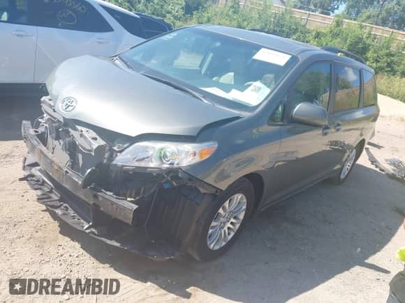 2011 Toyota Sienna XLE AAS with VIN 5TDYK3DC8BS073331, listed as a IAAI auction lot 43099376 with 145,679 mi miles and . Bid and sale history available at DreamBid. Image 2.