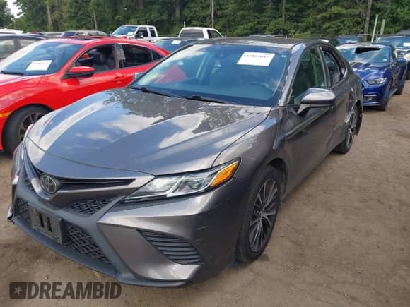 2020 Toyota Camry SE with VIN 4T1G11AK6LU910584, listed as a IAAI auction lot 43103047 with 148,126 mi miles and . Bid and sale history available at DreamBid. Image 2.