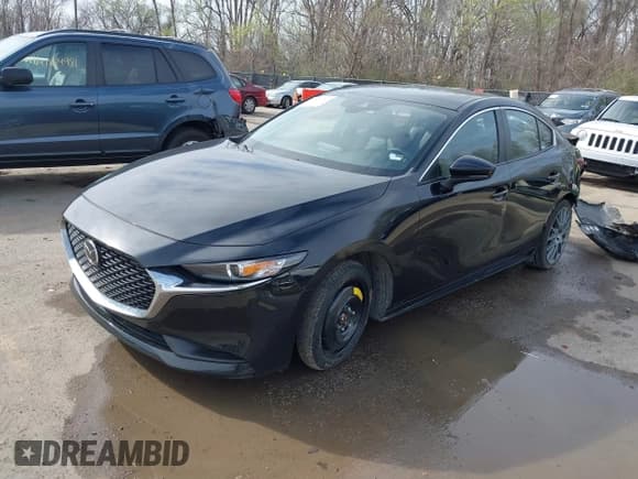 ✅ 2021 Mazda 3 Select • VIN: JM1BPABL7M1323365 • Лот: 41879962. Опубликован ранее на IAAI с пробегом 65 651 миль. Бесплатный доступ к архиву аукционных продаж из США и подробный отчёт об истории автомобиля на DreamBid. Изображение 2.
