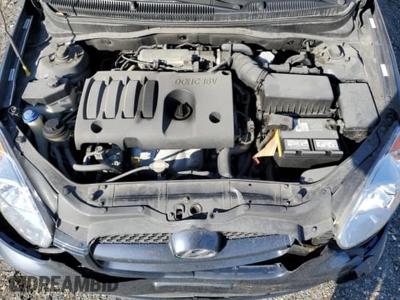 ✅ 2010 Hyundai Accent GS • VIN: KMHCM3AC8AU163948 • Лот: 84078474. Опубликован ранее на Copart с пробегом 39 257 миль. Бесплатный доступ к архиву аукционных продаж из США и подробный отчёт об истории автомобиля на DreamBid. Изображение 11.