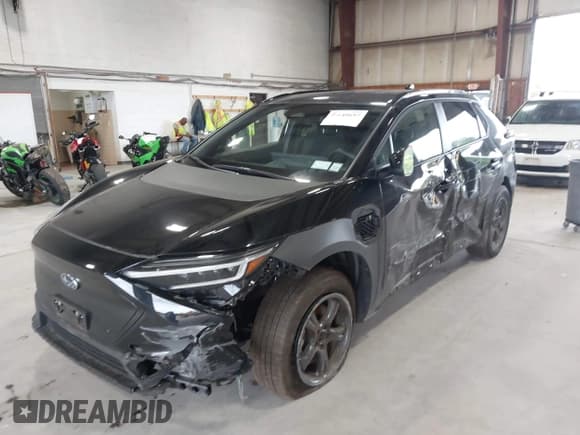 ✅ 2024 Subaru Solterra Touring • VIN: JTMABABA9RA052065 • Lot: 42648692. Wystawiony na IAAI z przebiegiem 13 880 mil. Bezpłatny archiwum sprzedaży aukcyjnych z USA i szczegółowy raport historii pojazdu na DreamBid. Zdjęcie 2.