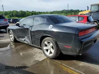 2013 Dodge Challenger SXT z VIN 2C3CDYAG4DH626054, wystawiony jako Copart lot #53808804 z przebiegiem 142 553 mil mil oraz Szkoda całkowita • Salvage title. Historia ofert i sprzedaży dostępna na DreamBid. Obrazek 2.