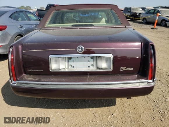 ✅ 1995 Cadillac Concours • VIN: 1G6KF52Y1SU245573 • Лот: 68715984. Опубликован ранее на Copart с пробегом Не указан. Бесплатный доступ к архиву аукционных продаж из США и подробный отчёт об истории автомобиля на DreamBid. Изображение 6.