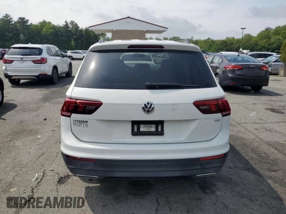 ✅ 2018 Volkswagen Tiguan S • VIN: 3VV1B7AX1JM072635 • Lot: 58413425. Listed on Copart with 79,514 mi. Free auction sales archive from the USA and detailed vehicle history report at DreamBid. Image 6.