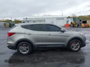 ✅ 2018 Hyundai Santa Fe 2.4L • VIN: 5NMZTDLB2JH095519 • Лот: 43462708. Опубликован ранее на IAAI с пробегом 87 498 миль. Бесплатный доступ к архиву аукционных продаж из США и подробный отчёт об истории автомобиля на DreamBid. Изображение 13.