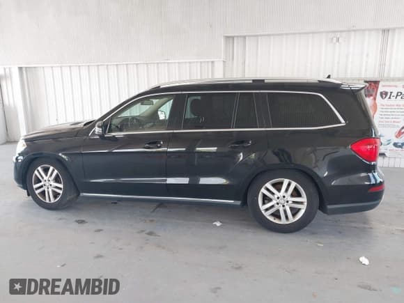✅ 2014 Mercedes-Benz GL 450 • VIN: 4JGDF7CE7EA435479 • Лот: 42280243. Опубликован ранее на IAAI с пробегом 138 930 миль. Бесплатный доступ к архиву аукционных продаж из США и подробный отчёт об истории автомобиля на DreamBid. Изображение 14.