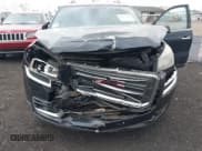 ✅ 2015 GMC Acadia SLT • VIN: 1GKKVSKD9FJ303629 • Lot: 43532131. Listed on IAAI with 145,378 mi. Free auction sales archive from the USA and detailed vehicle history report at DreamBid. Image 6.