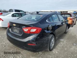 ✅ 2017 Chevrolet Cruze LT • VIN: 1G1BE5SM5H7206434 • Lot: 66750422. Listed on Copart with 88,429 mi. Free auction sales archive from the USA and detailed vehicle history report at DreamBid. Image 4.