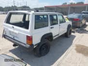 ✅ 1993 Jeep Cherokee • VIN: 1J4FT28S5PL640159 • Lot: 43117982. Listed on IAAI with 265,513 mi. Free auction sales archive from the USA and detailed vehicle history report at DreamBid. Image 4.