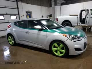 2012 Hyundai Veloster w/Red Int z VIN KMHTC6AD4CU058341, wystawiony jako Copart lot #69108484 z przebiegiem 97 841 mil mil oraz Czysty tytuł • Clean title. Historia ofert i sprzedaży dostępna na DreamBid. Obrazek 4.