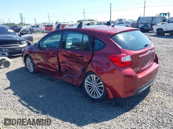 ✅ 2012 Subaru Impreza Premium • VIN: JF1GPAD62CH210772 • Lot: 42539790. Listed on IAAI with 102,298 mi. Free auction sales archive from the USA and detailed vehicle history report at DreamBid. Image 3.