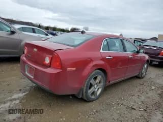 ✅ 2012 Chevrolet Malibu 1LT • VIN: 1G1ZC5E05CF350996 • Lot: 81281014. Listed on Copart with 174,772 mi. Free auction sales archive from the USA and detailed vehicle history report at DreamBid. Image 3.