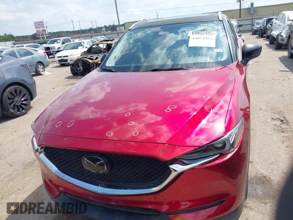 ✅ 2018 Mazda CX-5 Grand Touring • VIN: JM3KFADM3J1394722 • Lot: 43053904. Listed on IAAI with 111,491 mi. Free auction sales archive from the USA and detailed vehicle history report at DreamBid. Image 12.