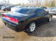 ✅ 2013 Dodge Challenger SXT • VIN: 2C3CDYAG5DH591010 • Lot: 41649468. Wystawiony na IAAI z przebiegiem 159 327 mil. Bezpłatny archiwum sprzedaży aukcyjnych z USA i szczegółowy raport historii pojazdu na DreamBid. Zdjęcie 4.