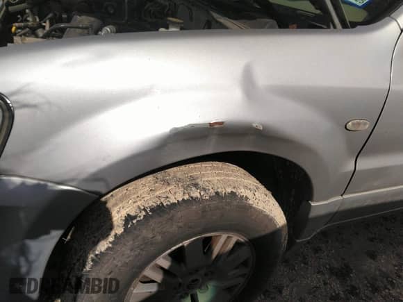 2007 Mercury Mariner Premier с VIN 4M2CU97107KJ08843, выставлен на аукционе IAAI как лот 41748968 с пробегом 194 183 миль миль и . История ставок и продаж доступна на DreamBid. Изображение 6.