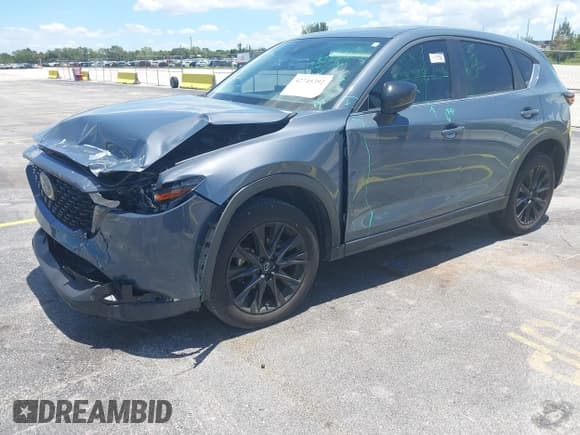 ✅ 2023 Mazda CX-5 S Carbon Edition • VIN: JM3KFBCM2P0200445 • Lot: 42745392. Listed on IAAI with 21,932 mi. Free auction sales archive from the USA and detailed vehicle history report at DreamBid. Image 6.