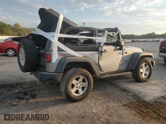 ✅ 2015 Jeep Wrangler Sport • VIN: 1C4AJWAG2FL690339 • Lot: 81990305. Listed on Copart with Not provided. Free auction sales archive from the USA and detailed vehicle history report at DreamBid. Image 3.