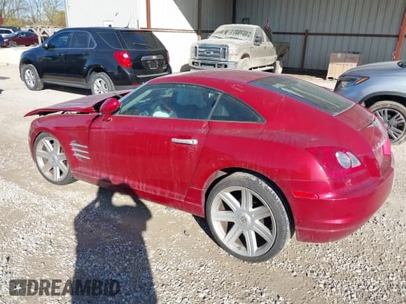 ✅ 2004 Chrysler Crossfire • VIN: 1C3AN69L04X002015 • Lot: 43680151. Listed on IAAI with 112,068 mi. Free auction sales archive from the USA and detailed vehicle history report at DreamBid. Image 3.