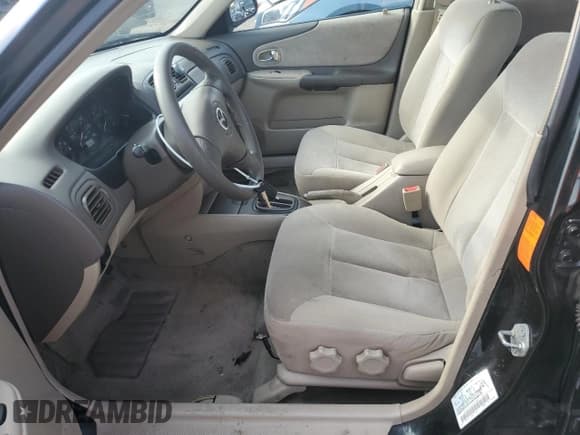 ✅ 2002 Mazda Protege DX • VIN: JM1BJ226420506761 • Lot: 65565115. Listed on Copart with 127,859 mi. Free auction sales archive from the USA and detailed vehicle history report at DreamBid. Image 7.