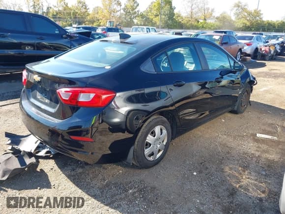 ✅ 2018 Chevrolet Cruze LS • VIN: 1G1BC5SM8J7228357 • Lot: 43515932. Listed on IAAI with 90,155 mi. Free auction sales archive from the USA and detailed vehicle history report at DreamBid. Image 4.