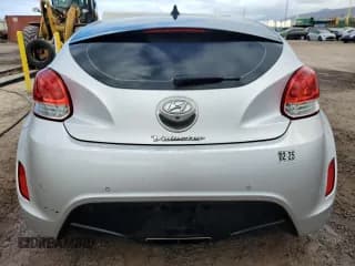 ✅ 2014 Hyundai Veloster • VIN: KMHTC6AD7EU209241 • Lot: 83997134. Wystawiony na Copart z przebiegiem 71 965 mil. Bezpłatny archiwum sprzedaży aukcyjnych z USA i szczegółowy raport historii pojazdu na DreamBid. Zdjęcie 6.