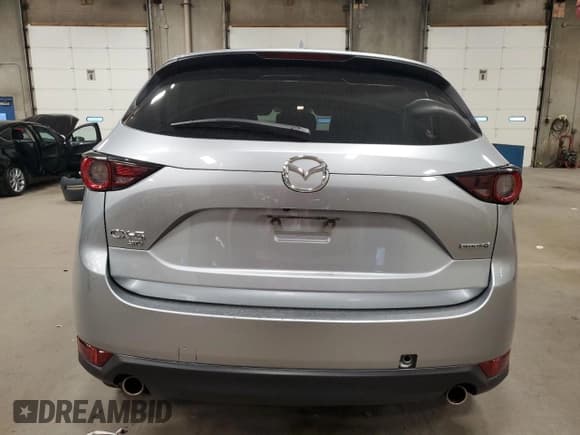 ✅ 2021 Mazda CX-5 Touring • VIN: JM3KFBCMXM0453623 • Lot: 90025385. Wystawiony na Copart z przebiegiem 83 246 mil. Bezpłatny archiwum sprzedaży aukcyjnych z USA i szczegółowy raport historii pojazdu na DreamBid. Zdjęcie 6.