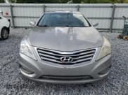 ✅ 2012 Hyundai Azera • VIN: KMHFG4JG7CA178216 • Лот: 64363375. Опубликован ранее на Copart с пробегом 121 847 миль. Бесплатный доступ к архиву аукционных продаж из США и подробный отчёт об истории автомобиля на DreamBid. Изображение 5.