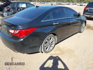 2013 Hyundai Sonata SE z VIN 5NPEC4AB6DH598687, wystawiony jako IAAI lot #43419253 z przebiegiem 186 801 mil mil oraz . Historia ofert i sprzedaży dostępna na DreamBid. Obrazek 4.