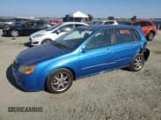 ✅ 2007 Kia Spectra • VIN: KNAFE162075006207 • Лот: 80697425. Опубликован ранее на Copart с пробегом 343 741 миль. Бесплатный доступ к архиву аукционных продаж из США и подробный отчёт об истории автомобиля на DreamBid. Изображение 1.