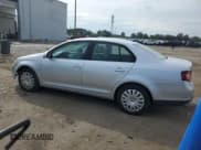✅ 2009 Volkswagen Jetta S • VIN: 3VWHM71K69M087622 • Lot: 81668285. Wystawiony na Copart z przebiegiem 229 683 mil. Bezpłatny archiwum sprzedaży aukcyjnych z USA i szczegółowy raport historii pojazdu na DreamBid. Zdjęcie 2.