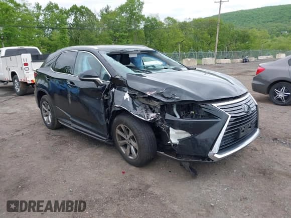 ✅ 2019 Lexus RX 350 • VIN: 2T2BZMCA4KC199715 • Lot: 43312998. Listed on IAAI with 72,054 mi. Free auction sales archive from the USA and detailed vehicle history report at DreamBid. Image 1.