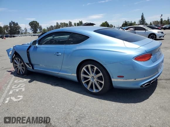 ✅ 2022 Bentley Continental GT GT V8 • VIN: SCBCG2ZG4NC094932 • Lot: 64056355. Listed on Copart with 6,596 mi. Free auction sales archive from the USA and detailed vehicle history report at DreamBid. Image 2.