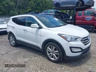 2015 Hyundai Santa Fe z VIN 5XYZWDLA7FG268323, wystawiony jako IAAI lot #42414648 z przebiegiem 123 028 mil mil oraz . Historia ofert i sprzedaży dostępna na DreamBid. Obrazek 1.