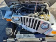 ✅ 2005 Jeep Wrangler Unlimited • VIN: 1J4FA44SX5P342719 • Лот: 84007275. Опубликован ранее на Copart с пробегом 171 614 миль. Бесплатный доступ к архиву аукционных продаж из США и подробный отчёт об истории автомобиля на DreamBid. Изображение 12.