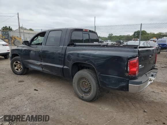 2005 Dodge Dakota ST z VIN 1D7HE28KX5S304735, wystawiony jako Copart lot #81015315 z przebiegiem 199 842 mil mil oraz Szkoda całkowita • Salvage title. Historia ofert i sprzedaży dostępna na DreamBid. Obrazek 2.