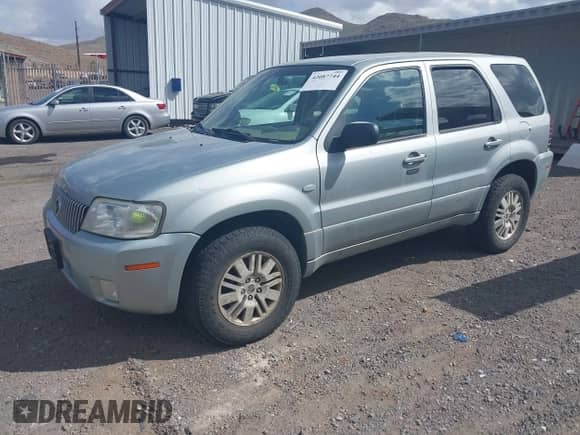 2006 Mercury Mariner Luxury z VIN 4M2CU57196KJ13921, wystawiony jako IAAI lot #42087744 z przebiegiem 183 899 mil mil oraz . Historia ofert i sprzedaży dostępna na DreamBid. Obrazek 2.