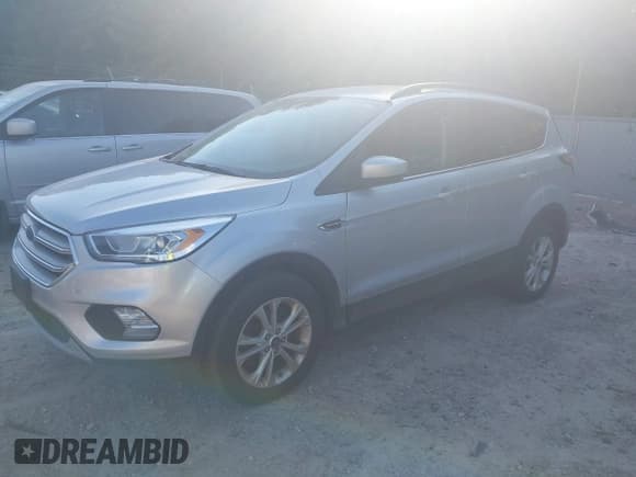 ✅ 2018 Ford Escape SEL • VIN: 1FMCU9HDXJUB45193 • Lot: 43334203. Listed on IAAI with 136,749 mi. Free auction sales archive from the USA and detailed vehicle history report at DreamBid. Image 17.
