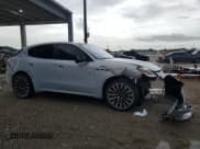 ✅ 2023 Maserati Grecale Modena • VIN: ZN682AVM5P7407858 • Lot: 63518455. Listed on Copart with 22,858 mi. Free auction sales archive from the USA and detailed vehicle history report at DreamBid. Image 4.