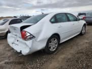 ✅ 2014 Chevrolet Impala LT • VIN: 2G1WB5E30E1137450 • Lot: 84210725. Listed on Copart with 223,428 mi. Free auction sales archive from the USA and detailed vehicle history report at DreamBid. Image 3.