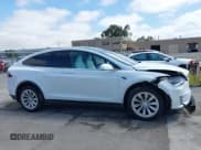 ✅ 2021 Tesla Model X Long Range Plus • VIN: 5YJXCDE27MF322200 • Lot: 42360282. Listed on IAAI with 37,072 mi. Free auction sales archive from the USA and detailed vehicle history report at DreamBid. Image 13.